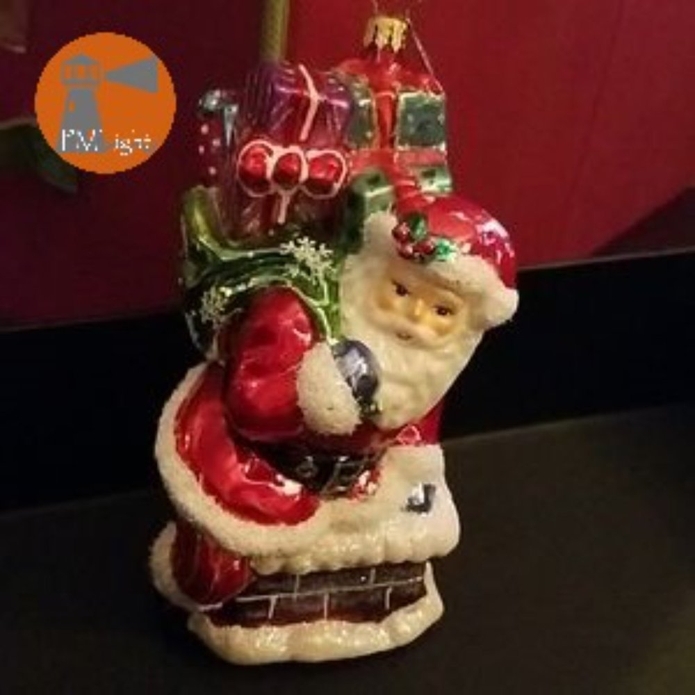 Radko Ornament Santa Claus in Chimney Delivering Presents
